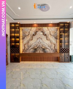 Kệ tivi phòng khách kết hợp vân đá PVC nhựa có chiều sâu tại Trần Vỹ Mai Dịch